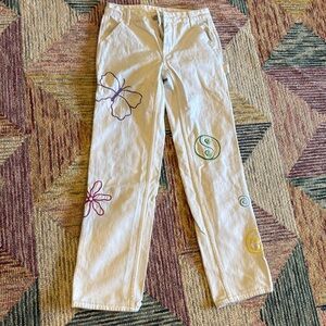 Pacsun graphic low rise jeans .